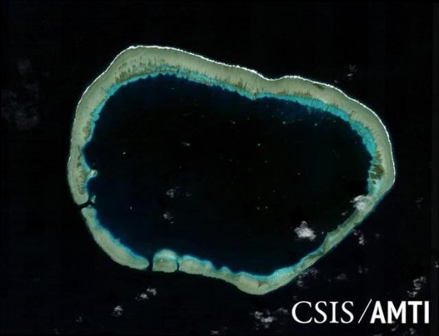 Mischief reef, located in the disputed Spratly Islands in the South China Sea, is shown in this handout Center for Strategic and International Studies (CSIS) Asia Maritime Transparency Initiative satellite image taken January 22, 2006 and released to Reuters October 27, 2015. REUTERS/CSIS Asia Maritime Transparency Initiative/DigitalGlobe/Handout via Reuters/files